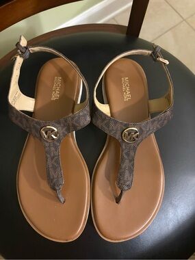 Michael Kors Brown MK Logo T-Strap Sandals with Gold Emblem